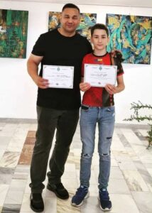 48d70076-2dd9-453c-9be0-a22c4b8a02d7-214x300 Club Sportiv Rizea Wushu - Campioni și Galerie foto
